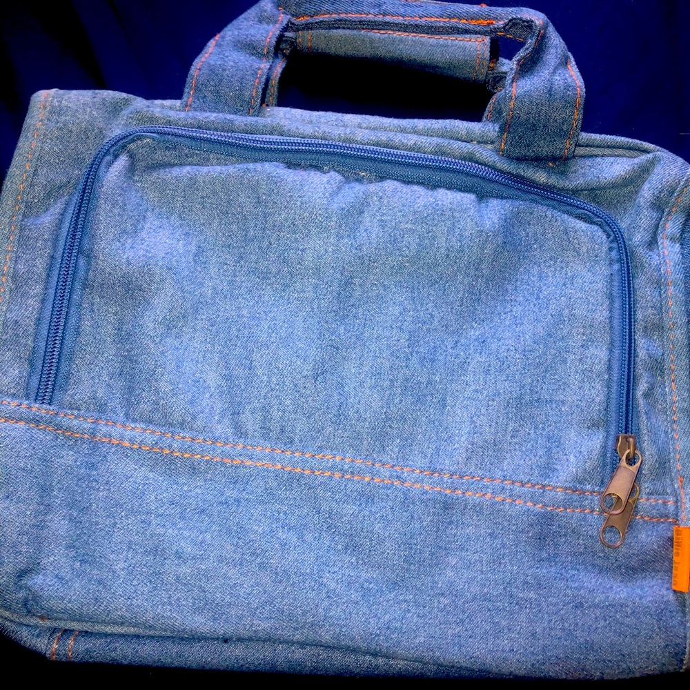 This is a beautiful blue Jean makeup/art purse. Great for makeup or materials.💙